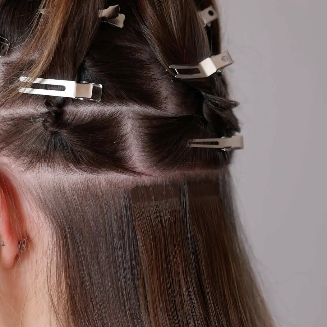 Friseur Bergemann Bochum Haarverlaengerung bhbd Tape application